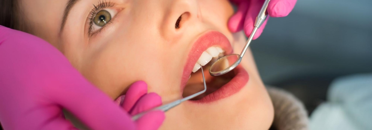 close-up shot of a woman having a dental checkup.